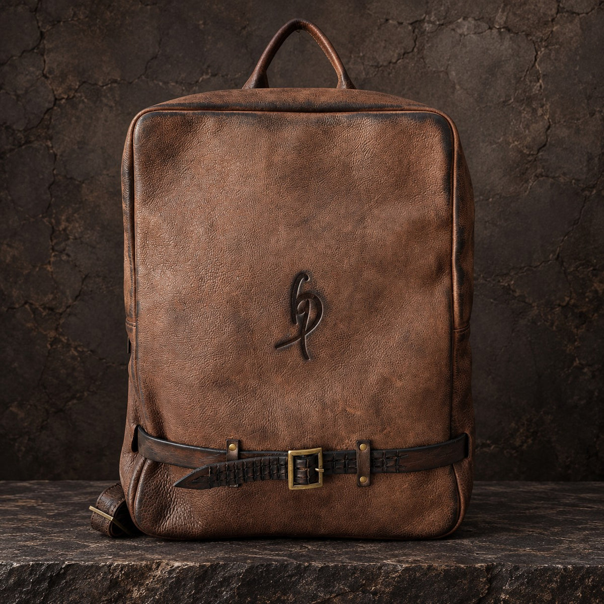 Hand-dyed brown leather backpack showing natural shading of the leather – ISHAOR