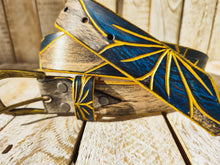 Artisanal White Leather Belt with Engraved Blue Flower Design, Black Wash Finish, and Gilded Details