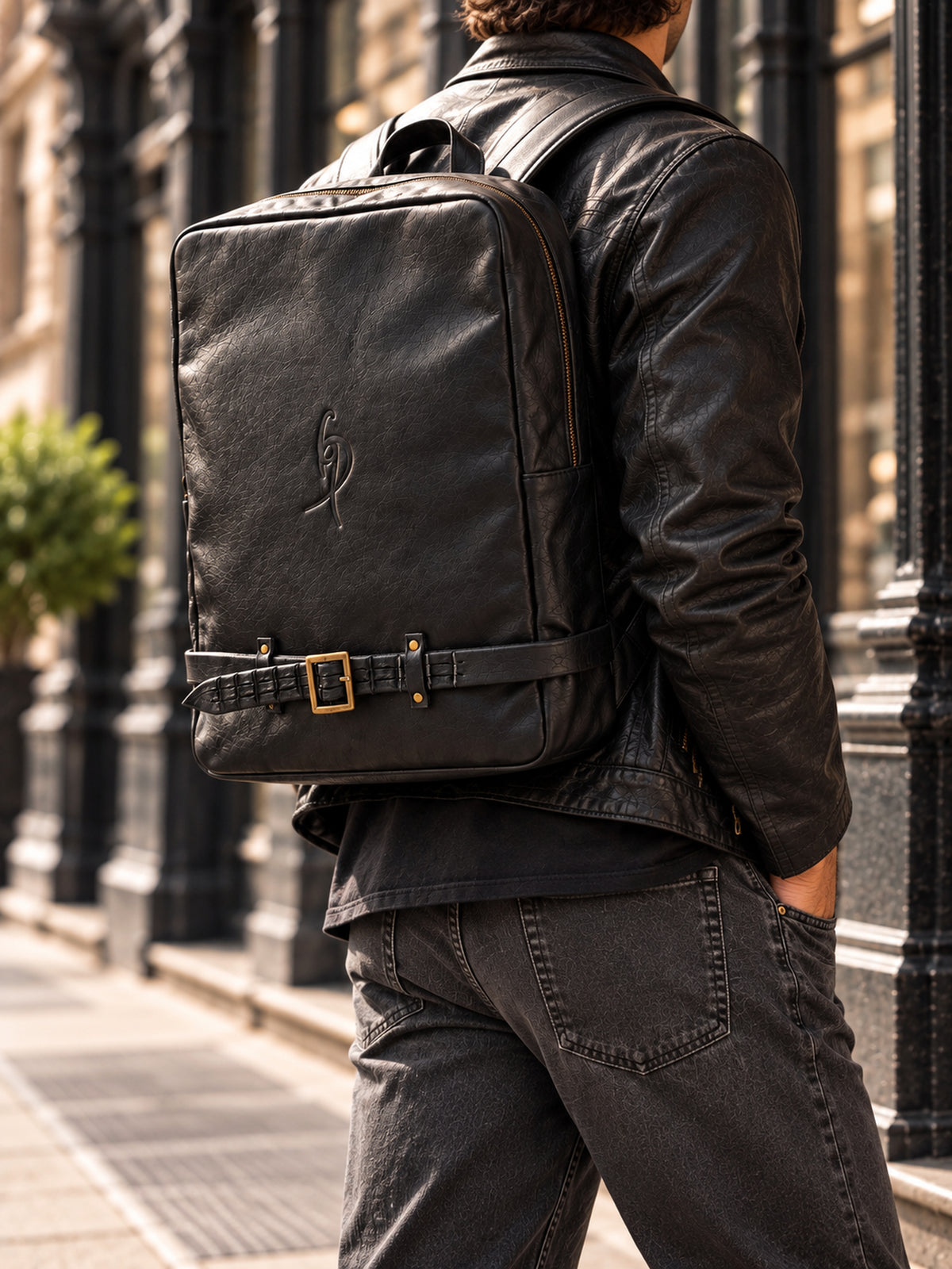 Man wearing black leather laptop backpack for work – handmade ISHAOR backpack