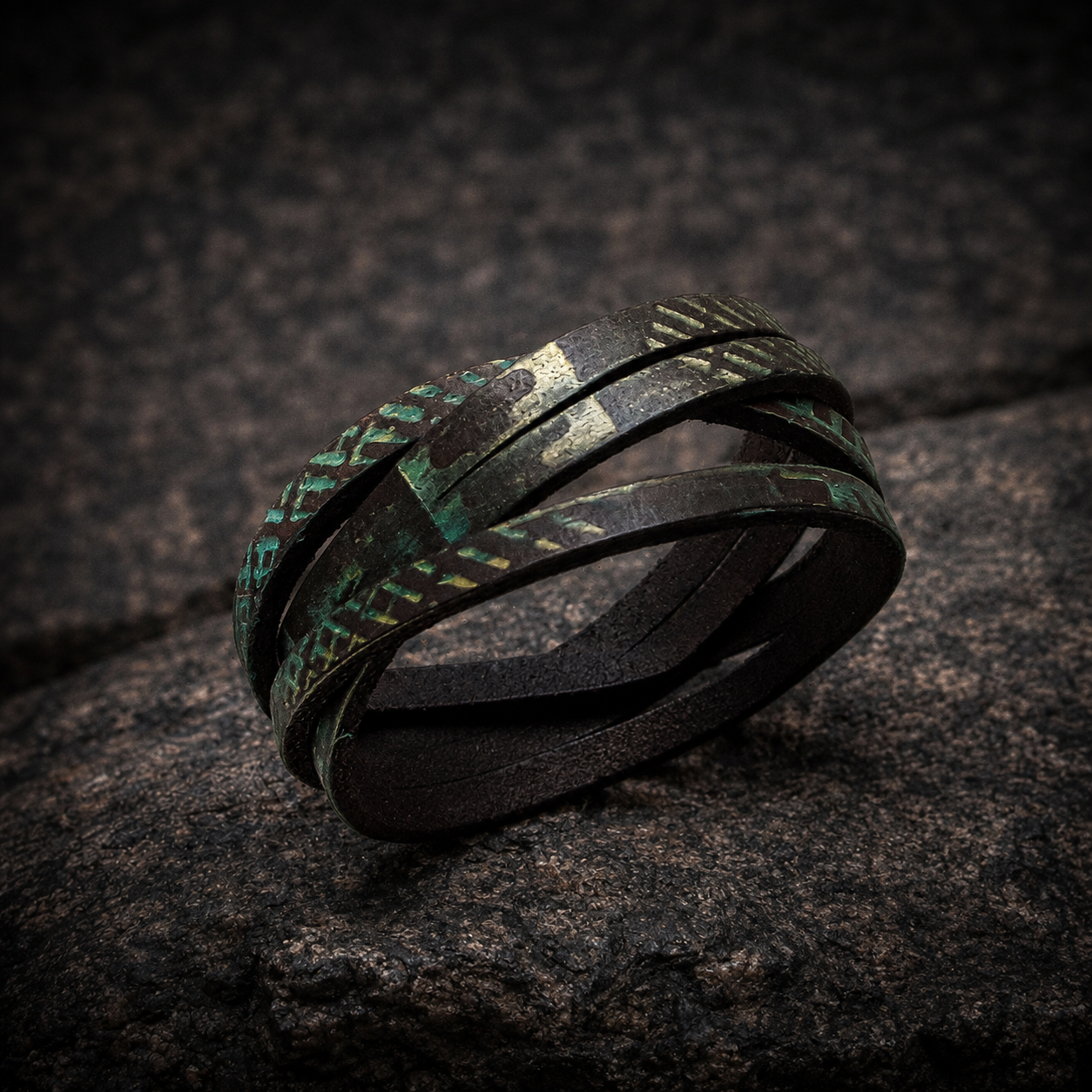 Brown leather wrap bracelet with golden and turquoise engraving and a silver clasp