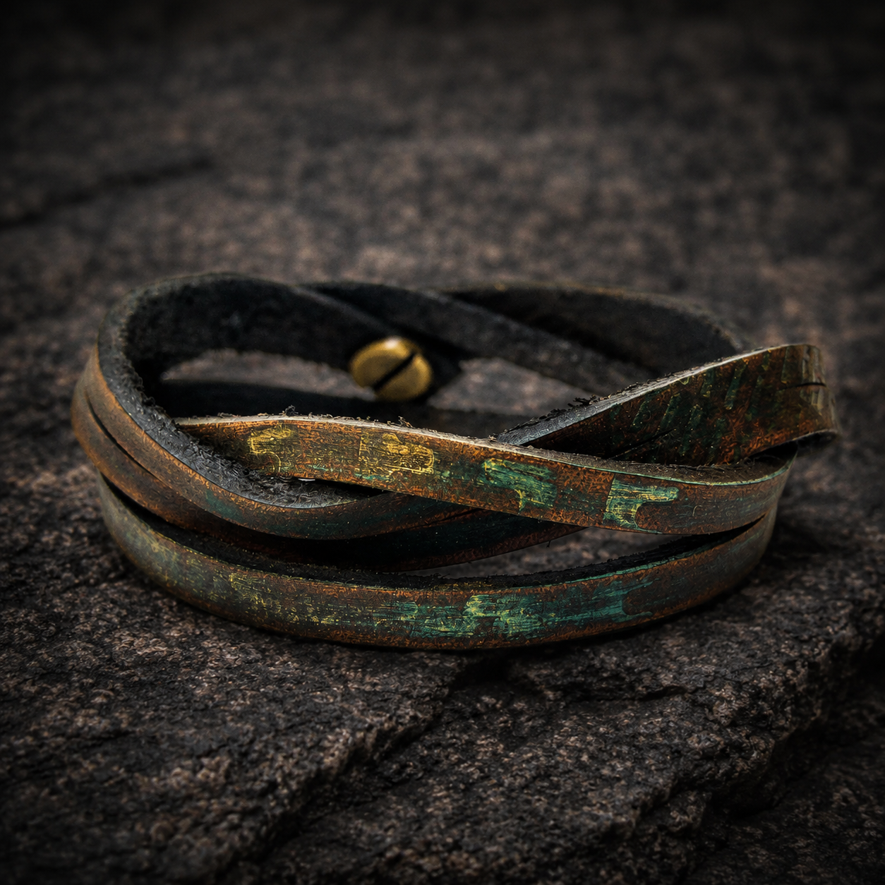 Brown leather wrap bracelet with golden and turquoise engraving and a silver clasp
