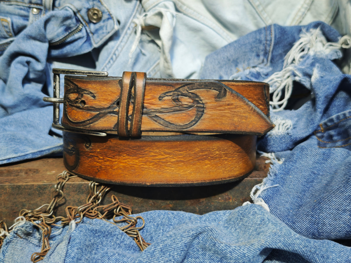 Brown leather belt with a metal buckle embossed with a unique decorative pattern – ISHAOR
