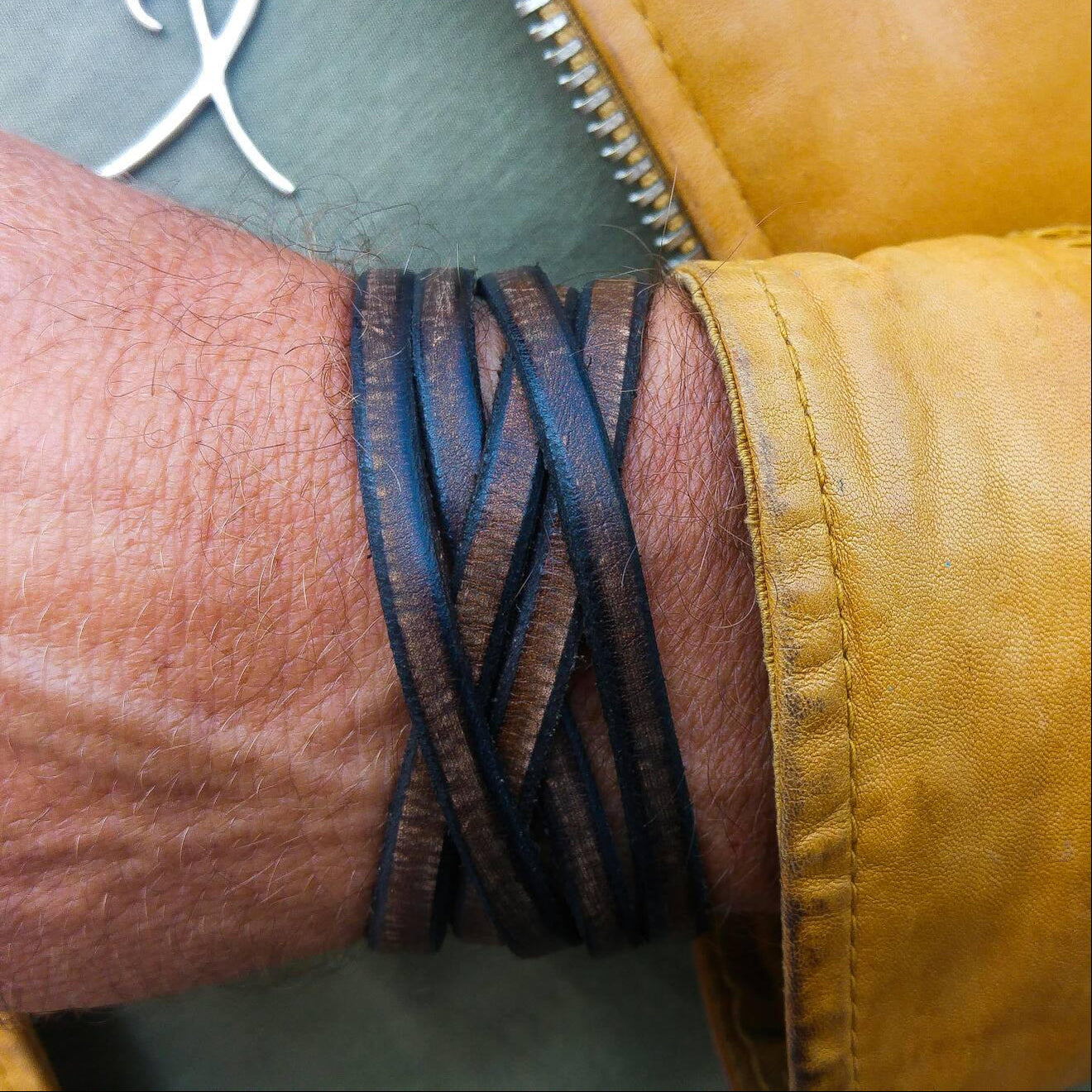 Ishaor brown leather bracelet build from  2  connectable leather straps that you can wear together or separated.