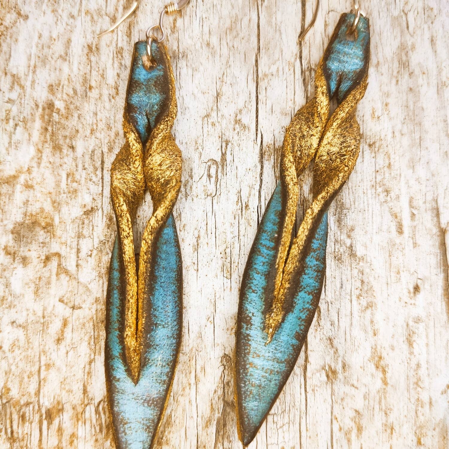 Handmade turquoise leather earing with brown wash and gold, you can wear it in both sides, you get two beautiful earings in one.