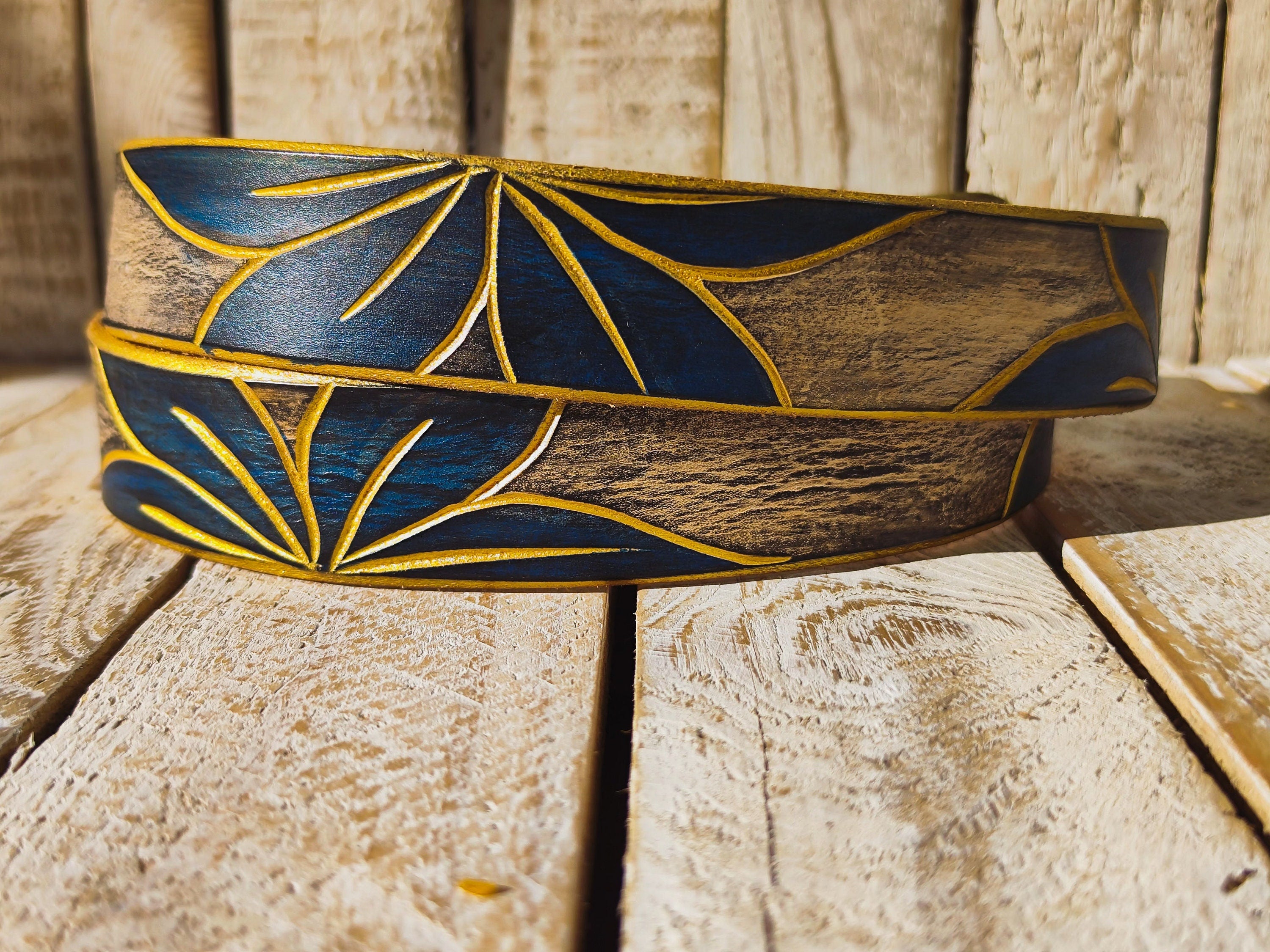 Artisanal White Leather Belt with Engraved Blue Flower Design, Black Wash Finish, and Gilded Details