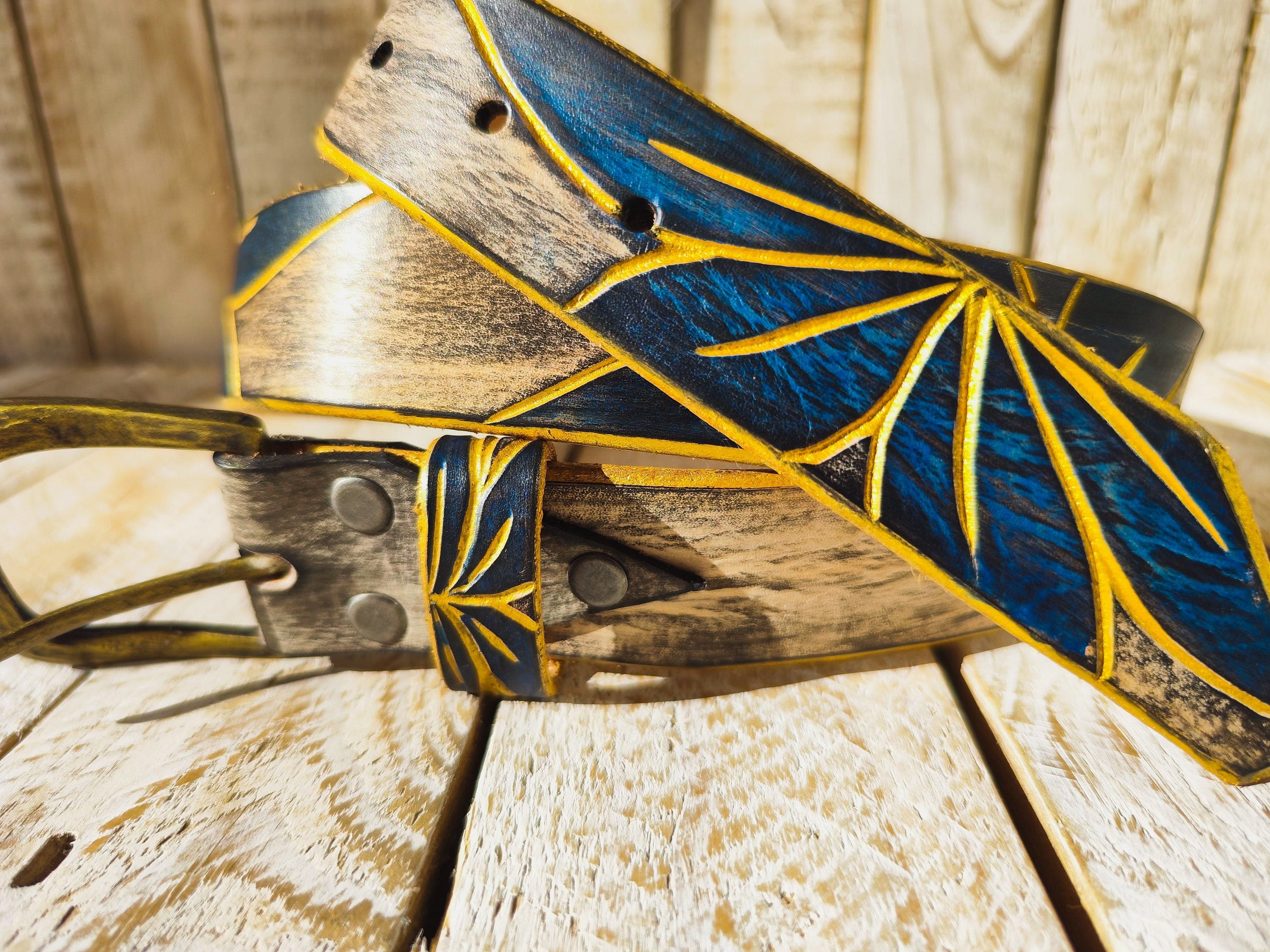 Artisanal White Leather Belt with Engraved Blue Flower Design, Black Wash Finish, and Gilded Details
