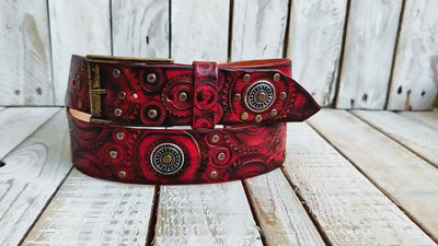 Biker's Delight: Handcrafted Red Leather Belt with Motorcycle Gear Stamps, Black Wash, Silver Studs, and Silver Coins