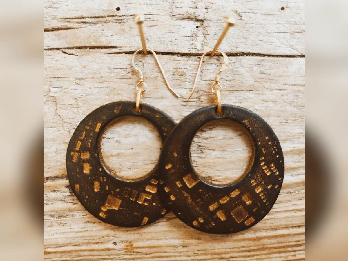 Handmade brown leather round earring with stamps of computer part and gold that you can wear on both sides