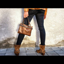 Small brown leather bag