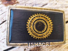 a Ishaor original square buckle with dark brown leather inside & motorcycle gear stamp in gold  ,stunning buckle that will upgrade any belt
