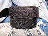 A black leather belt decorated with ishaor logo, unique handmade leather belt by ishaor ,perfect gift for men&#39;s that like specials products