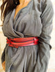 A red waist leathet belt with black wash. perfect belt for dress jacket and oversize clothes gives you a unique look must in every closet