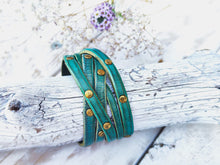 Handmade Turquoise Leather Bracelet with  greenWash and touch of gold decorate with Elegant Gold pieces