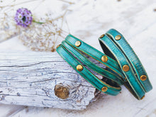 Handmade Turquoise Leather Bracelet with  greenWash and touch of gold decorate with Elegant Gold pieces