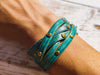 Handmade Turquoise Leather Bracelet with greenWash and touch of gold decorate with Elegant Gold pieces