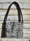 Artisan-Crafted Elegance: Handmade White Leather Women's Handbag with Intriguing Black Texture