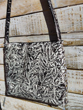 Artisan-Crafted Elegance: Handmade White Leather Women's Handbag with Intriguing Black Texture