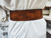 Brown leather waist belt with asymmetrical design and bronze Ring. Brown dress corset for women, wide leather belt