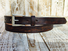 Distressed dark brown Narrow Leather Belt for men and women with a silver buckle.A Statement Piece for Your Jeans Stunning rough finish.